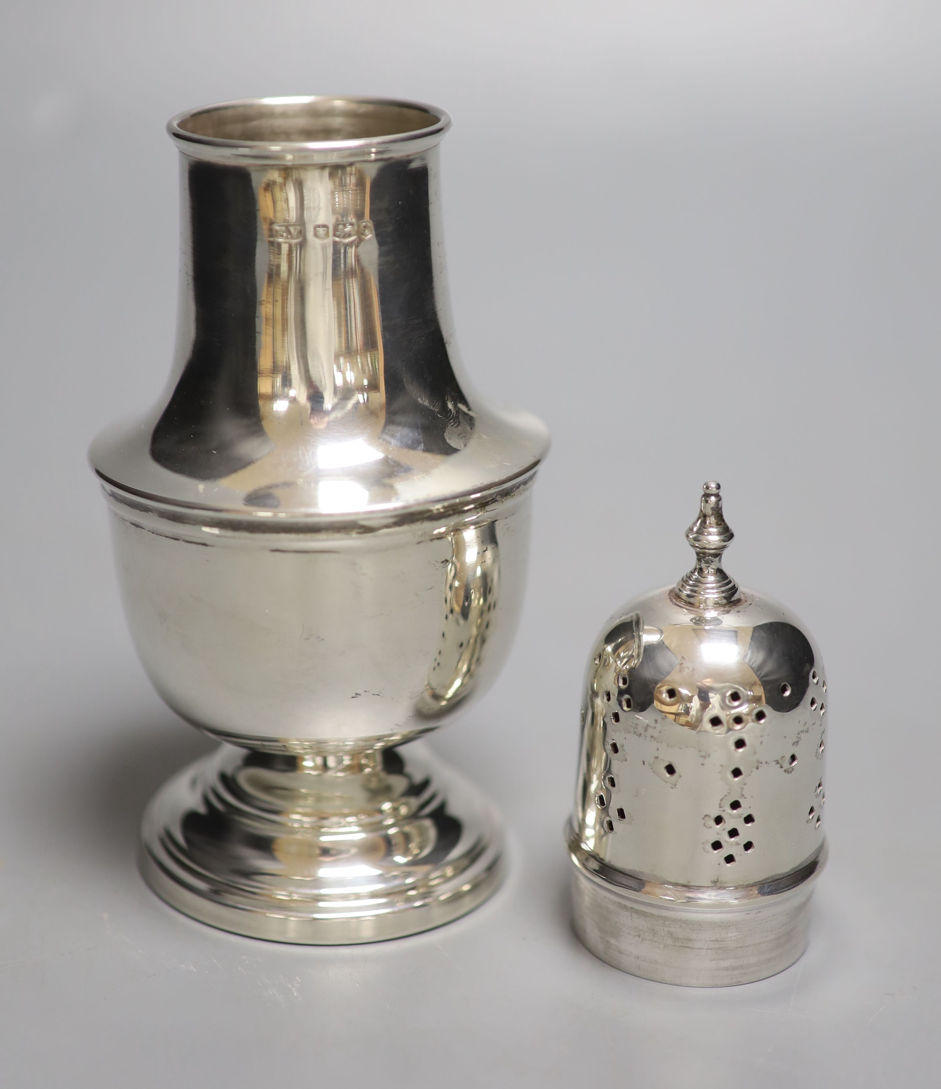 A 1960s silver sugar caster, with engraved inscription, 18cm, 4.5oz (a.f.).